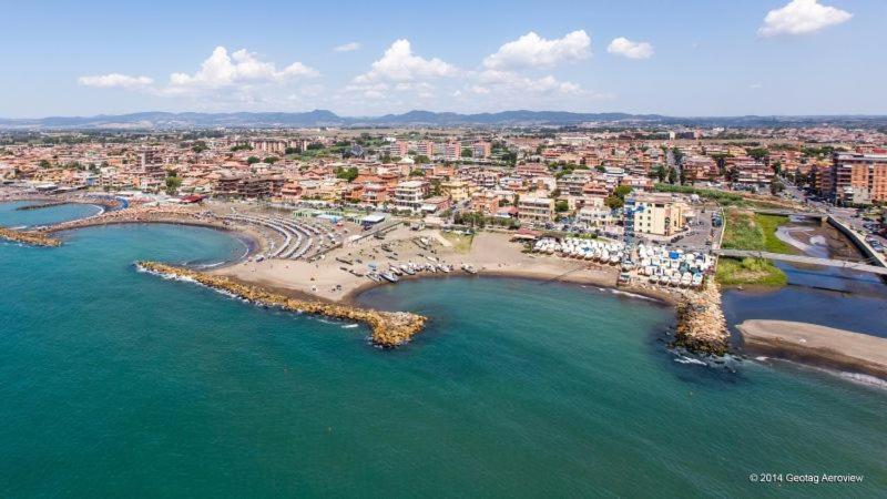 Rosso Tramonto Luxury-white- Ladispoli, Lungomare Regina Elena 58 Ladispoli